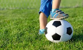 soccer ball with child's foot.jpg