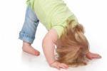 Baby doing a head stand.
